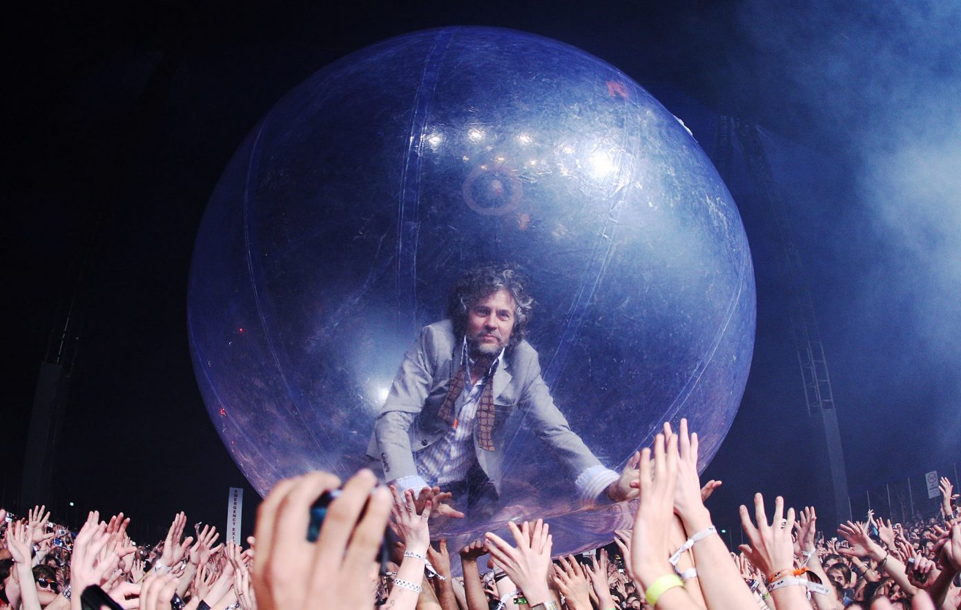 Watch The Flaming Lips play gig with crowd inside plastic bubbles