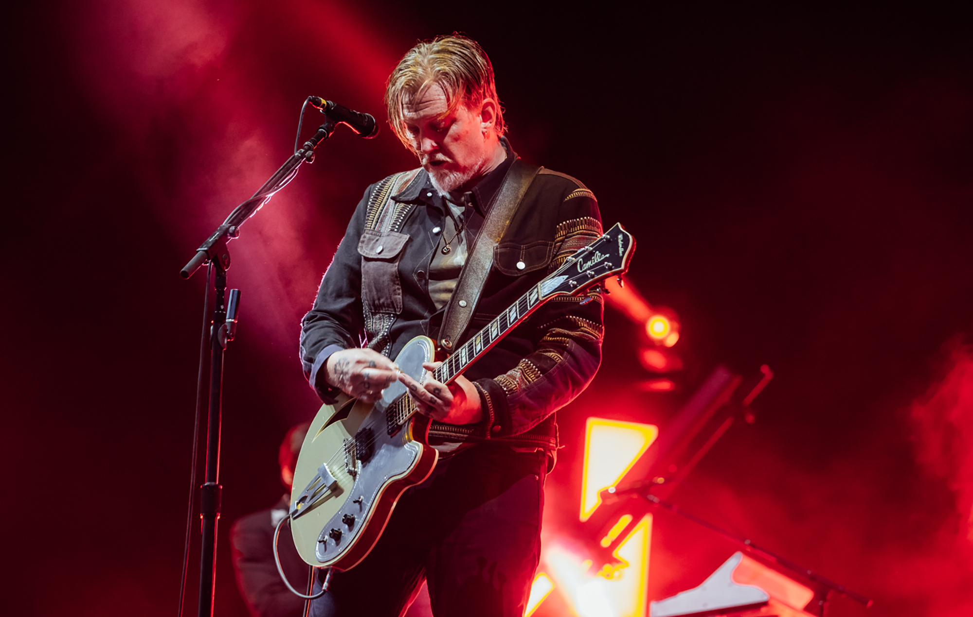 Watch Queens Of The Stone Age’s ‘Alive In The Catacombs’ and ‘Alive In Paris And Before’ online for free