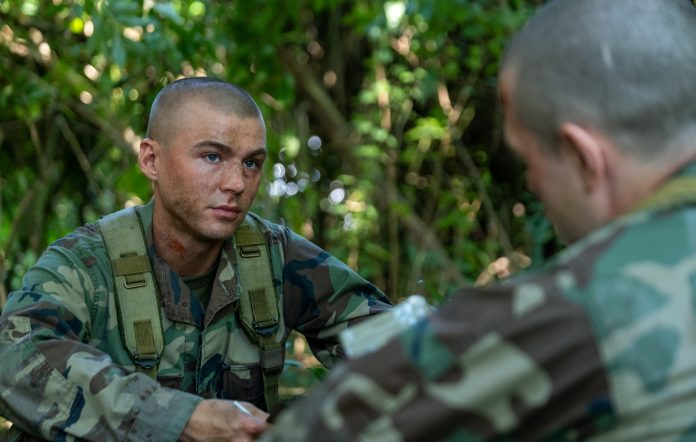 Miles Heizer in Boots