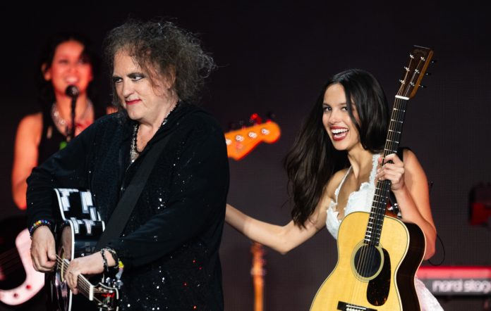 Robert Smith of The Cure and Olivia Rodrigo performing live together, photo by Samir Hussein/WireImage/Getty